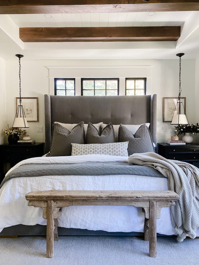 Bedroom with styled dual chest drawer bedside tables