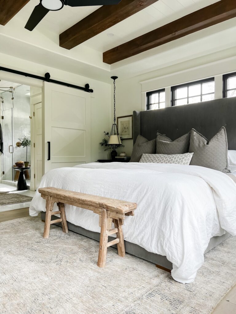 primary bedroom with neutral area rug, roundup of my favorite area rugs