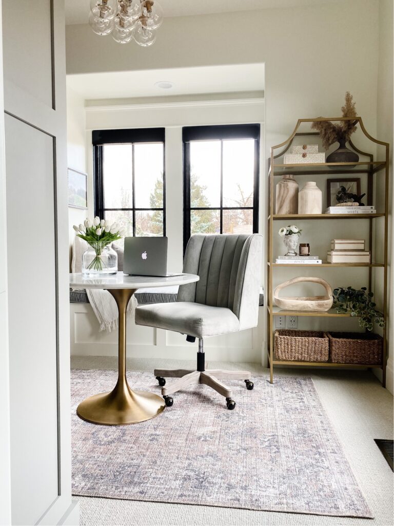 office space with blush area rug