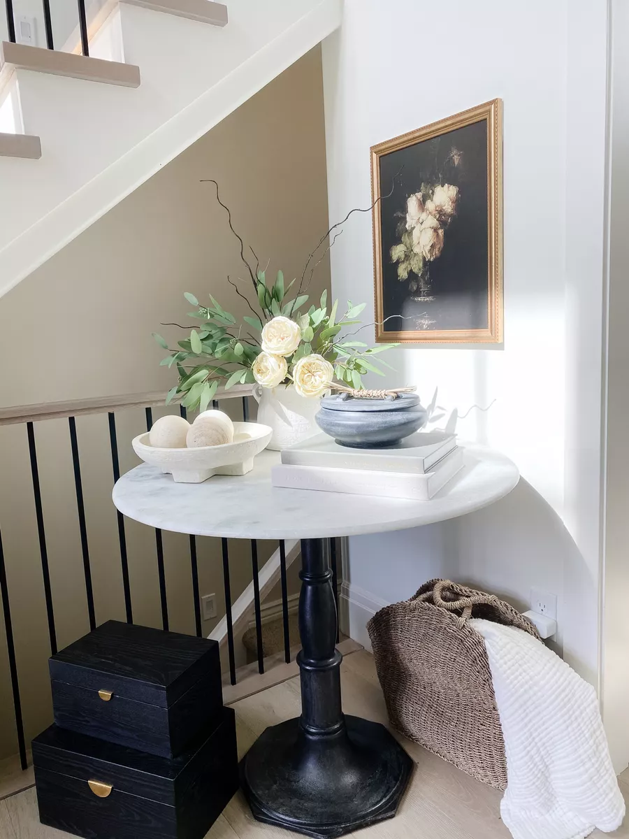 faux greenery next to staircase